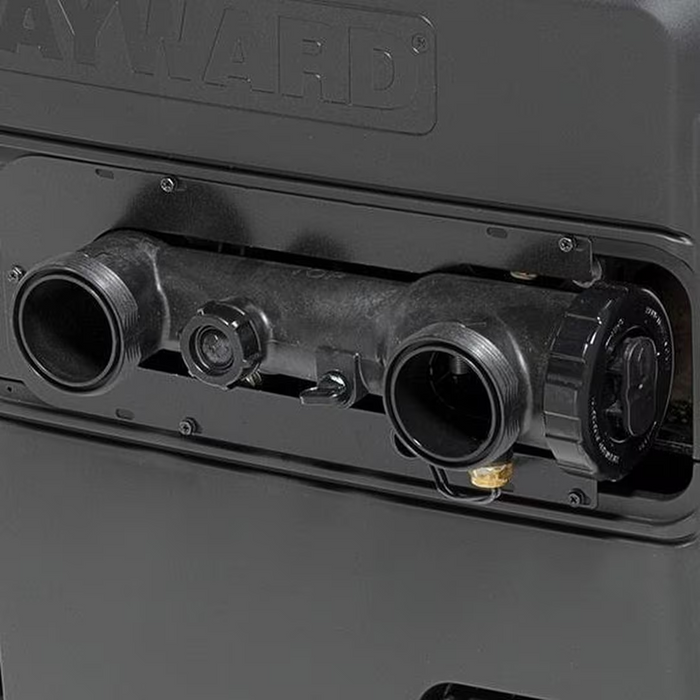 Close-up of the connection panel on the Hayward 250K BTU H-Series Natural Gas Heater Cupro Nickel W3H250FDN, featuring multiple black pipe fittings. This energy-efficient heater from Hayward not only provides effective heating but also offers low NOx emissions, making it an ideal choice for any discerning pool service professional.