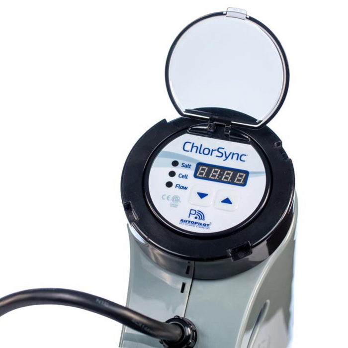 Close-up of an AutoPilot CS30 ChlorSync® Salt Chlorine Cell 30K gal with an open lid, displaying a digital screen and control buttons.