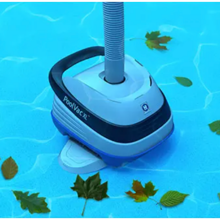 The Hayward W32025ADC Pool Vac XL Suction Pool Cleaner (designed for Concrete/Gunite Pools) effortlessly navigates the pool, its suction side mechanism effectively clearing scattered leaves from the water surface. This automatic pool cleaner ensures a pristine swimming environment with minimal effort.