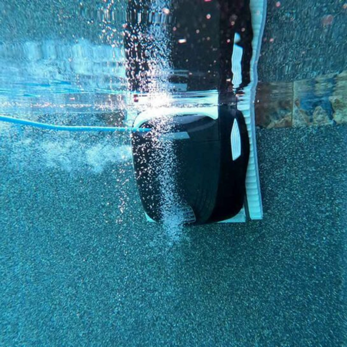 The Maytronics Dolphin Explorer E30 with WiFi Robotic Pool Cleaner 99996241-XPI, leveraging advanced Dolphin technology, releases bubbles while efficiently cleaning the pool floor. Control and monitor the process seamlessly with the MyDolphin Plus app for a sparkling clean pool every time.