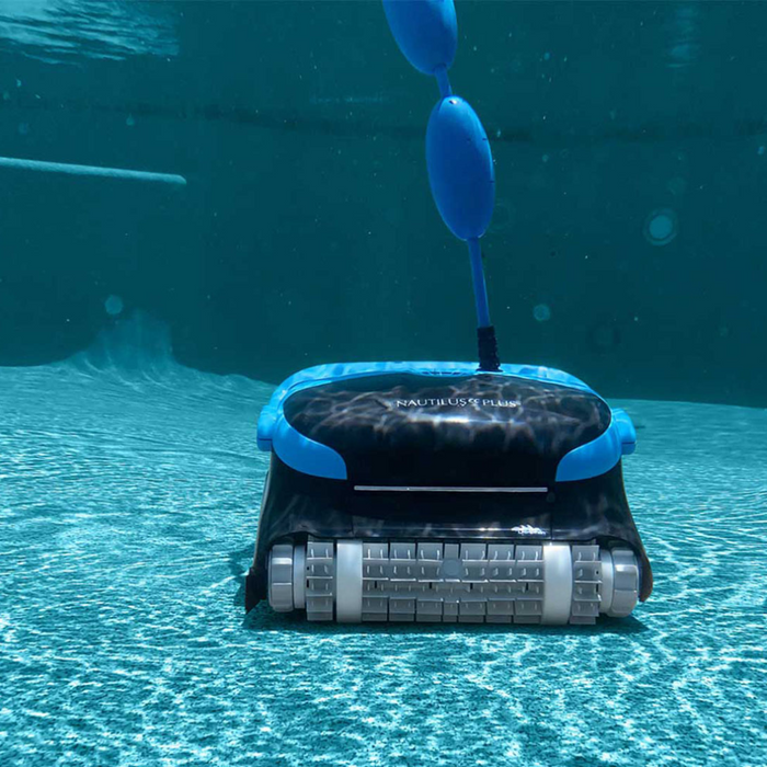 The Maytronics Dolphin Nautilus CC Plus Cleaner 99996406-PCI (with Wi-Fi), an underwater robotic pool cleaner with blue accents, effortlessly cleans the pool floor. Connect it to the MyDolphin Plus app for enhanced control and monitoring of your pool robot.