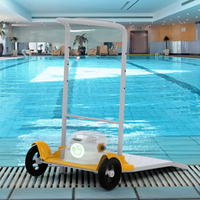 The Maytronics Dolphin Wave 140 Commercial Robotic Pool Cleaner 99997140-US, a pool cleaning robot boasting wheels and a convenient handle, is placed next to an indoor swimming pool. Renowned for its heavy-duty scrubbing capabilities, it also conserves energy while effectively maintaining your pool's cleanliness.