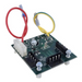 A green circuit board featuring wires and connectors, mounted on a compact platform with screws, closely resembles the sophisticated integration found in the Pentair Pool 521218 IntelliChlor® i5+3 New Style Load Center SCG Surge Board PCBA for EasyTouch® PL4/PSL4 Control System.