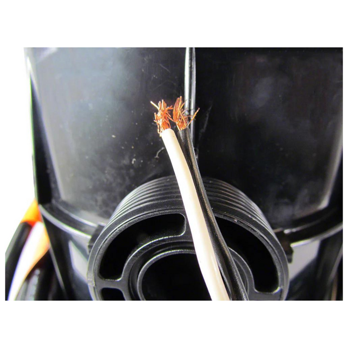 Close-up of a cut electrical wire with exposed copper strands against a black background, reminiscent of the precision seen in installations using the Pentair 590021 Magicstream Laminar LED Light Engine with Body 100' Cord by Pentair Pool.