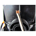 Close-up of a cut electrical wire with exposed copper strands against a black background, reminiscent of the precision seen in installations using the Pentair 590021 Magicstream Laminar LED Light Engine with Body 100' Cord by Pentair Pool.