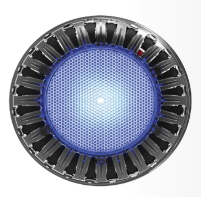 A round, metallic object with a blue and white illuminated center, resembling a futuristic light or vent. This innovative design is reminiscent of Spa Electrics' ATOM EM Niche Style 3" LED Pool Lights, featuring high-intensity Ceramic Light Engine technology.