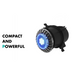 A compact, black electronic device featuring a blue-lit circular core. Text: "COMPACT AND POWERFUL" displayed on the left. The high-intensity Spa Electrics ATOM EM Niche Style 3" LED Pool Light integrates seamlessly with Spa Electrics technology.