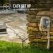 Pool equipment, including the Hayward R130 Robotic Cleaner for pools up to 50', plugged into an outdoor outlet with a protective cover next to a stone pillar. Text reads "Easy Set Up" for pool cleaners from Hayward.