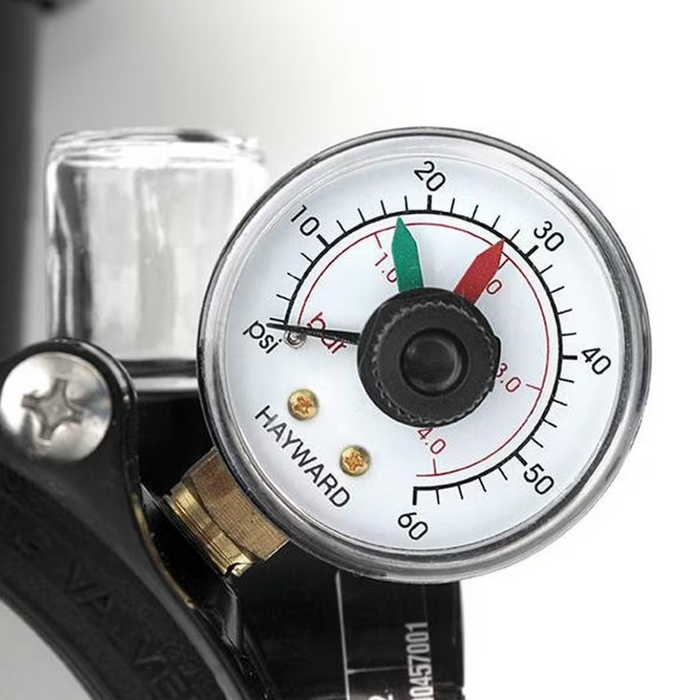 A close-up of a pressure gauge showing readings from 0 to 60 psi, installed on a Hayward device. This model features the Hayward SP0710X62 Side Mount Multiport Backwash Valve with 1-1/2" ports for seamless maintenance and is ideal for sand swimming pool filters.